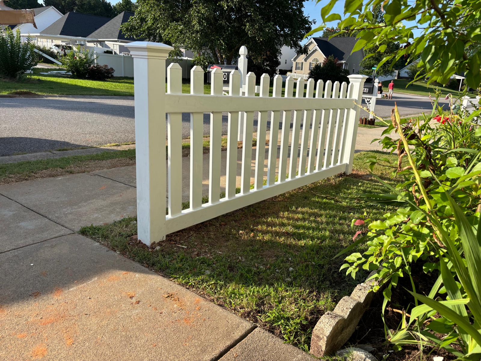 Completed white picket-style residential garden gate